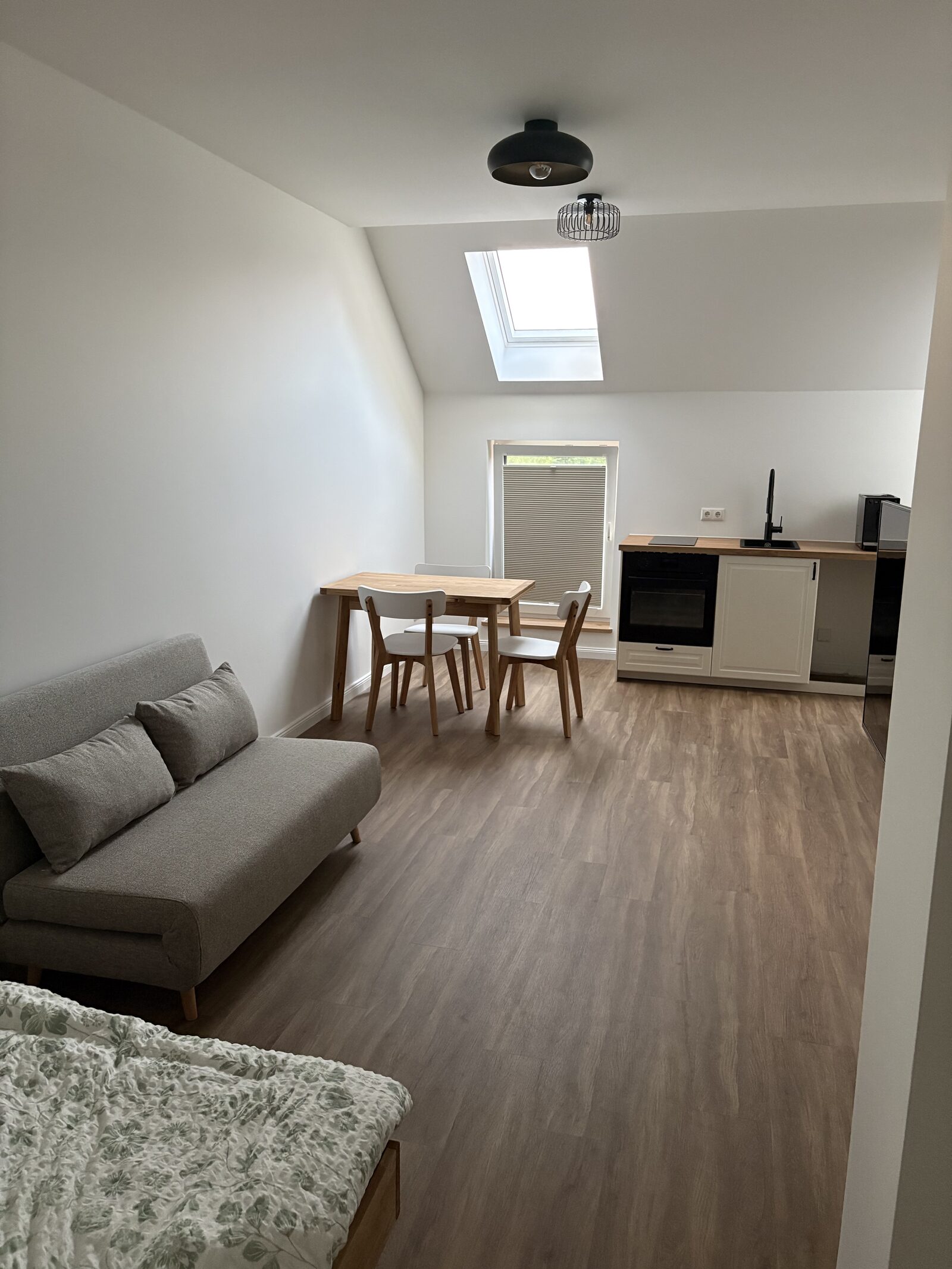 Gartenblick – Wohnraum mit Küche